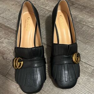 Black healed loafers